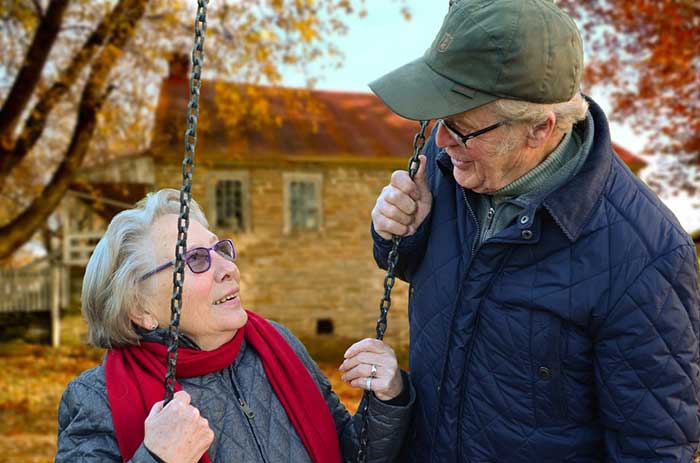 Elderly couple enjoying in the garden