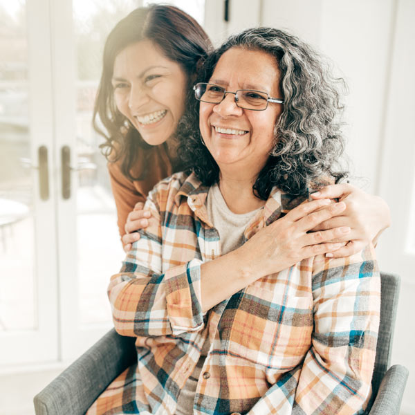 mother and daughter laughing