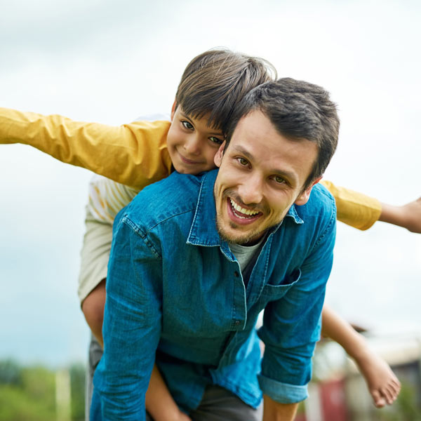 father and son playing together