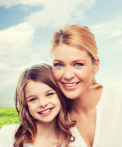 Mother and daughter after receiving dental cavity care in Southfield, MI