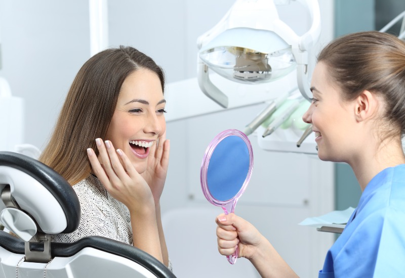 Women happy after the cosmetic dental treatment in Southfield, MI