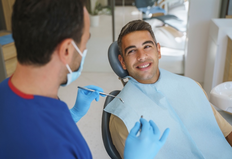 Smiling patient after bonding treatment in Southfield, MI