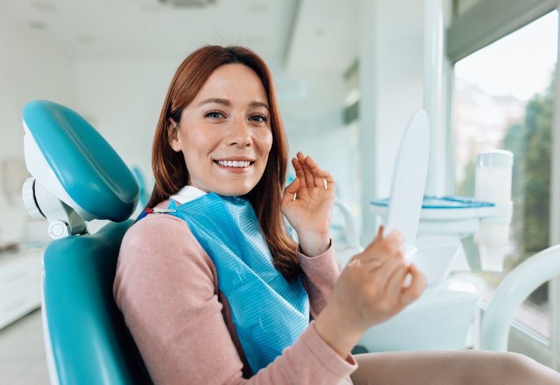 Smiling patient after veneers treatment in Southfield, MI