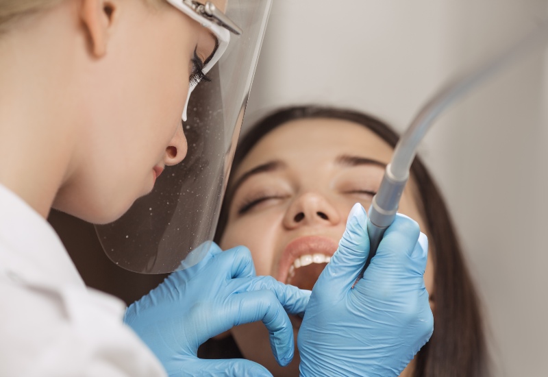 Dental bonding treatment in progress in Southfield, MI