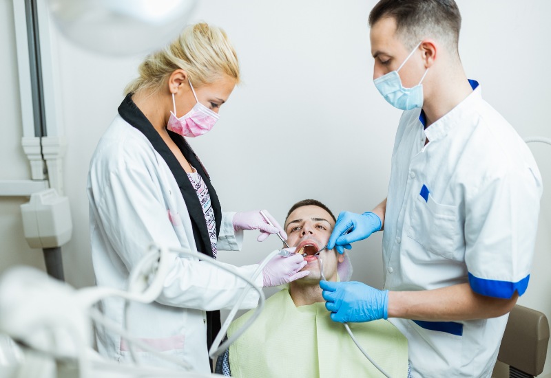 Dental crown treatment in progress at clinic in Southfield, MI